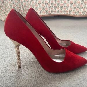 Elegant Red Heels with Gold Spiral Stiletto